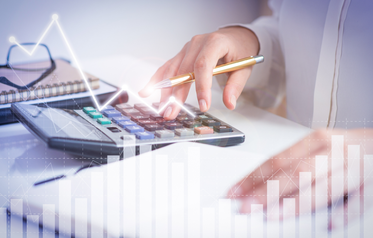 accountant calculating profit with financial analysis graphs
